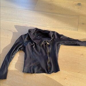 Zara Black Leather Jacket with Front Zipper Closure and Fitted Sleeves